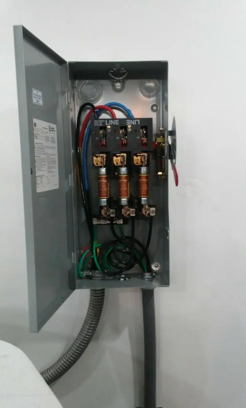 Three-phase disconnect switch installed for Smoke Detector Installation in Gulf Park Estates